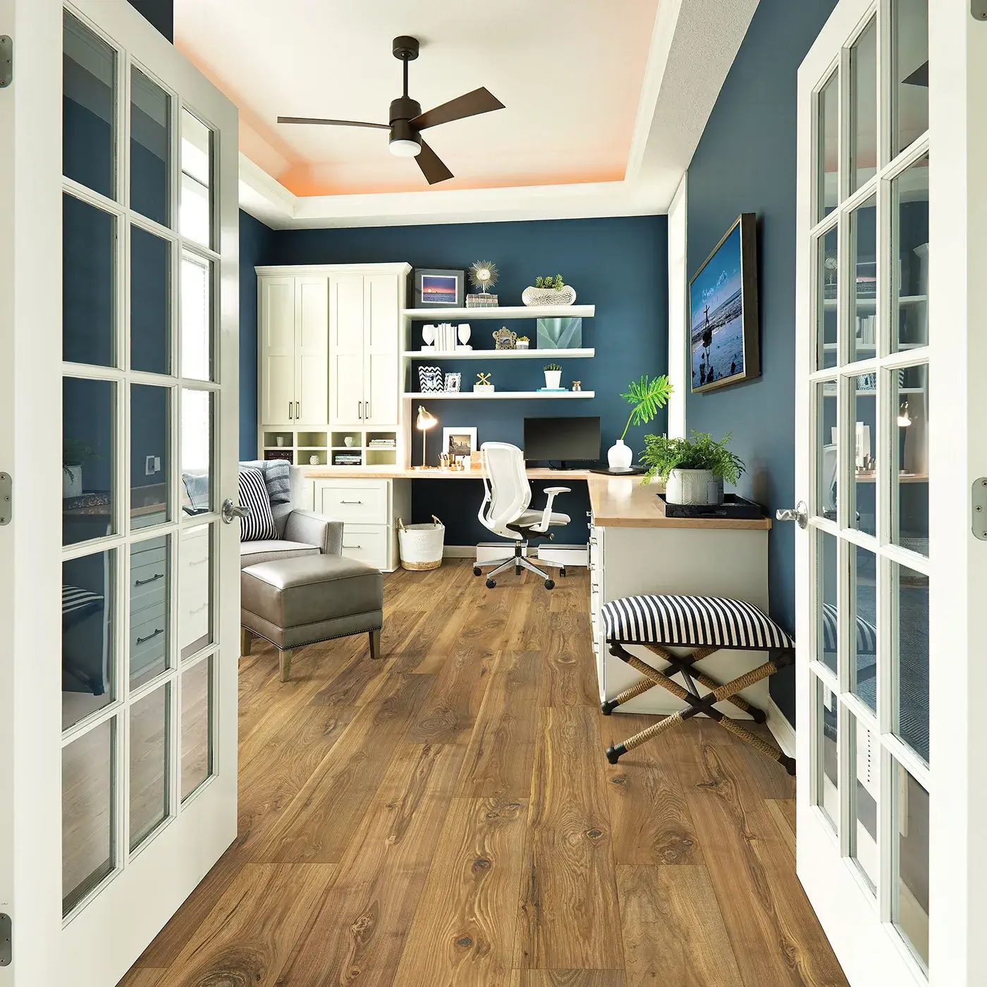 33607_03_room Laminate in a medium brown wood tone in a home office | Donald E. McNabb Flooring